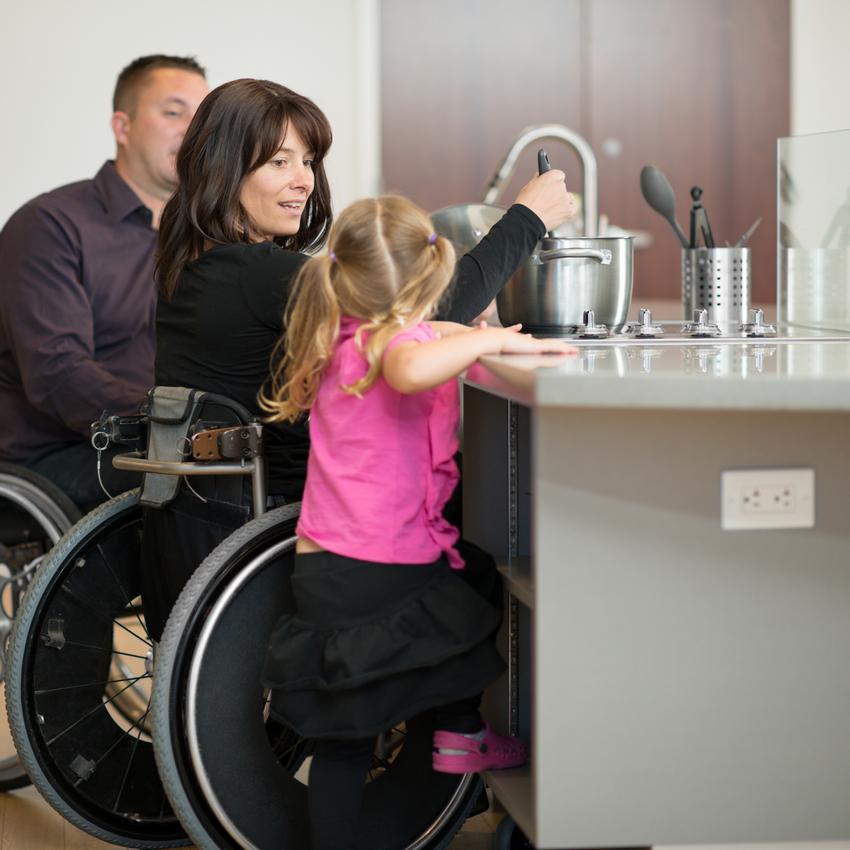 Family cooking in the kitchen - Copyright iStock_000021921554